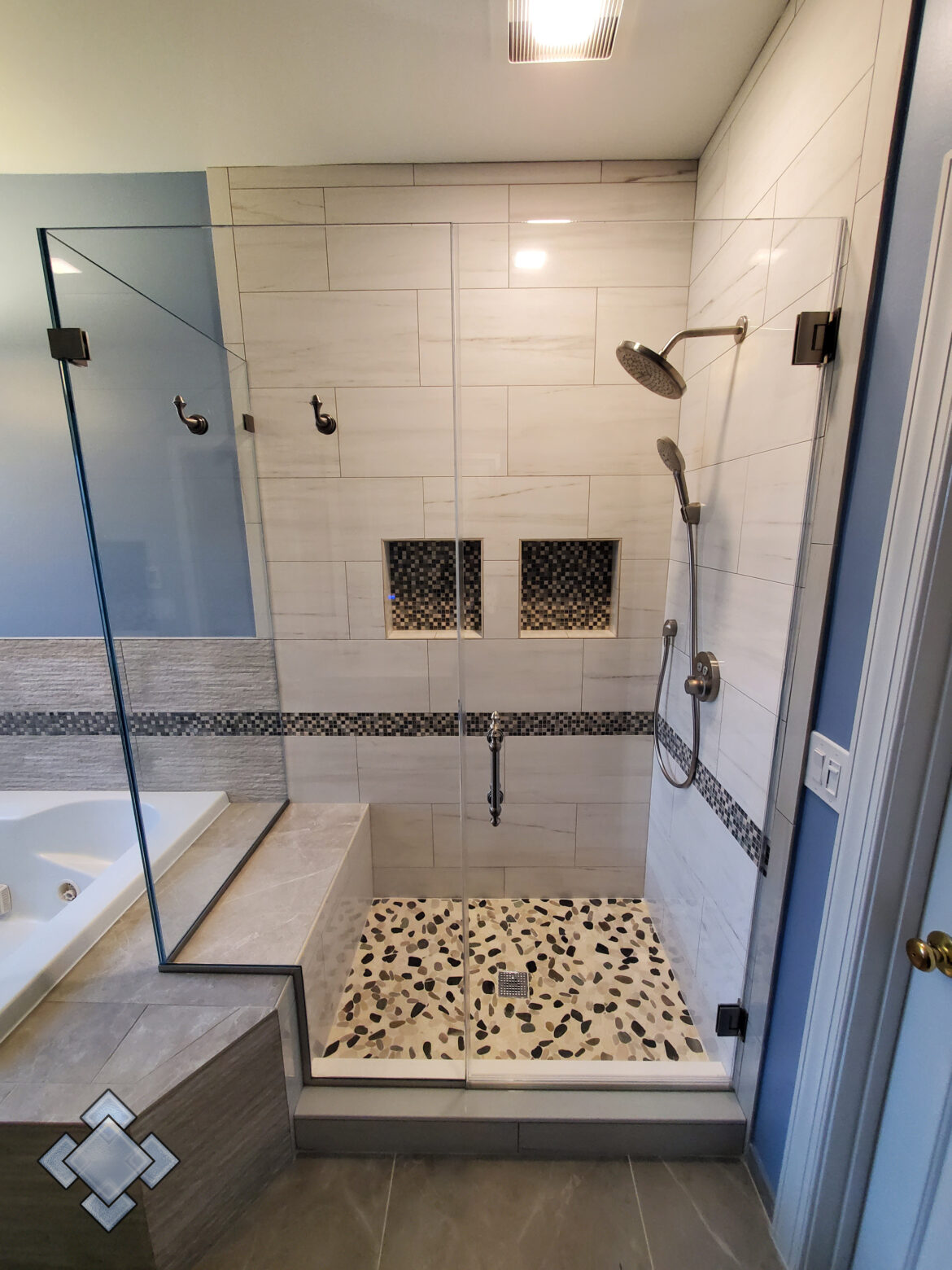 Corner shower unit in Alexandria Virginia with Symphony hardware