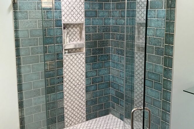 Neo angle shower door unit with aquamarine tile