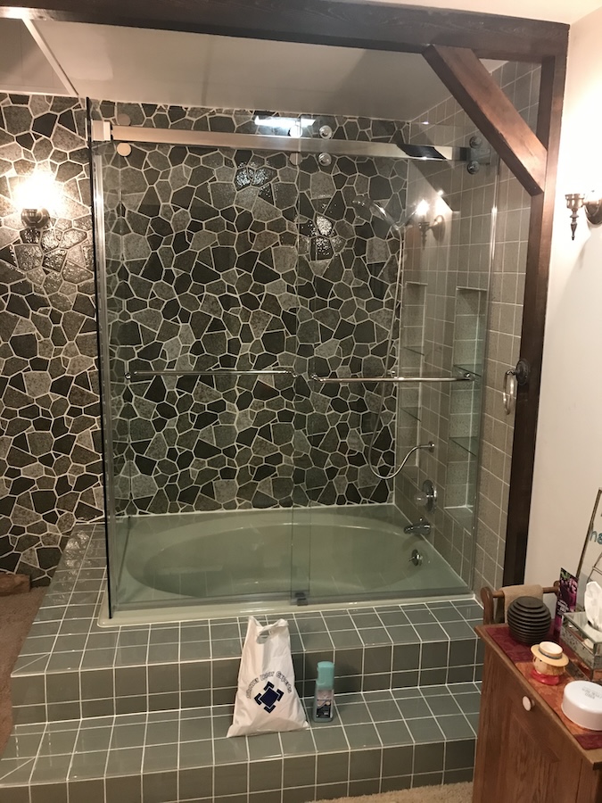 frameless Cambridge barn door tub doors - unique corner tub installation in Frederick, MD