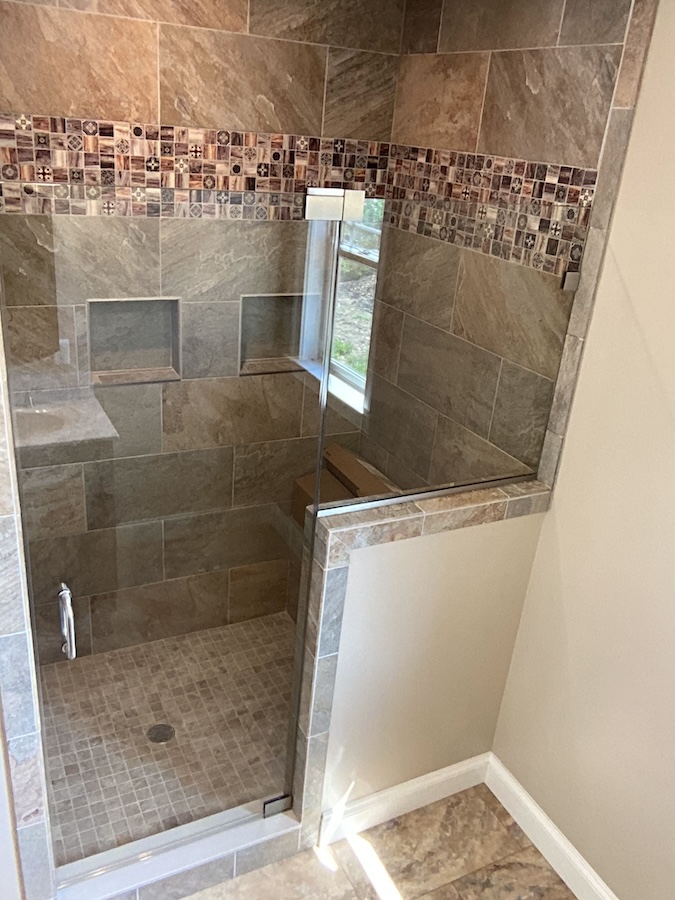 frameless door and panel shower door, panel on kneel wall