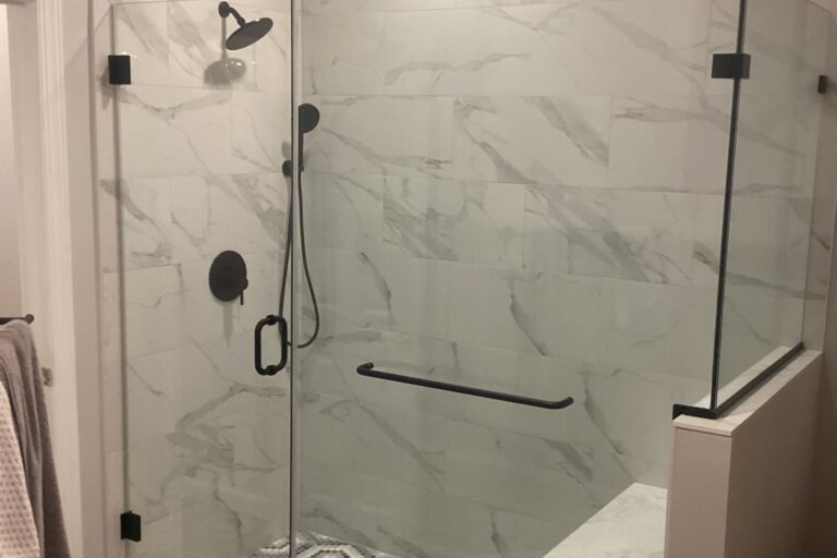 frameless glass corner shower door in Gaithersburg, MD with bench seat